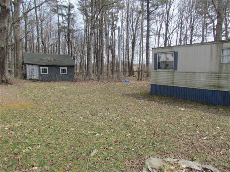 14 +/ Wooded Acres, Mobile Home, Ranch for Sale in Pennsylvania